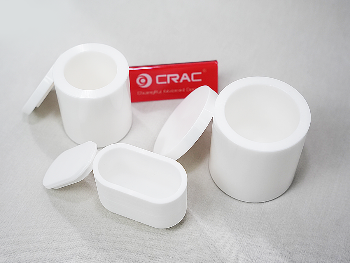 Multiple sizes of CRAC zirconia ceramic ball milling jars showing graduated dimensional range for planetary ball mills
